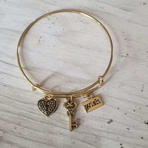 Bracelets by Sandra gold tone adjustable, wish